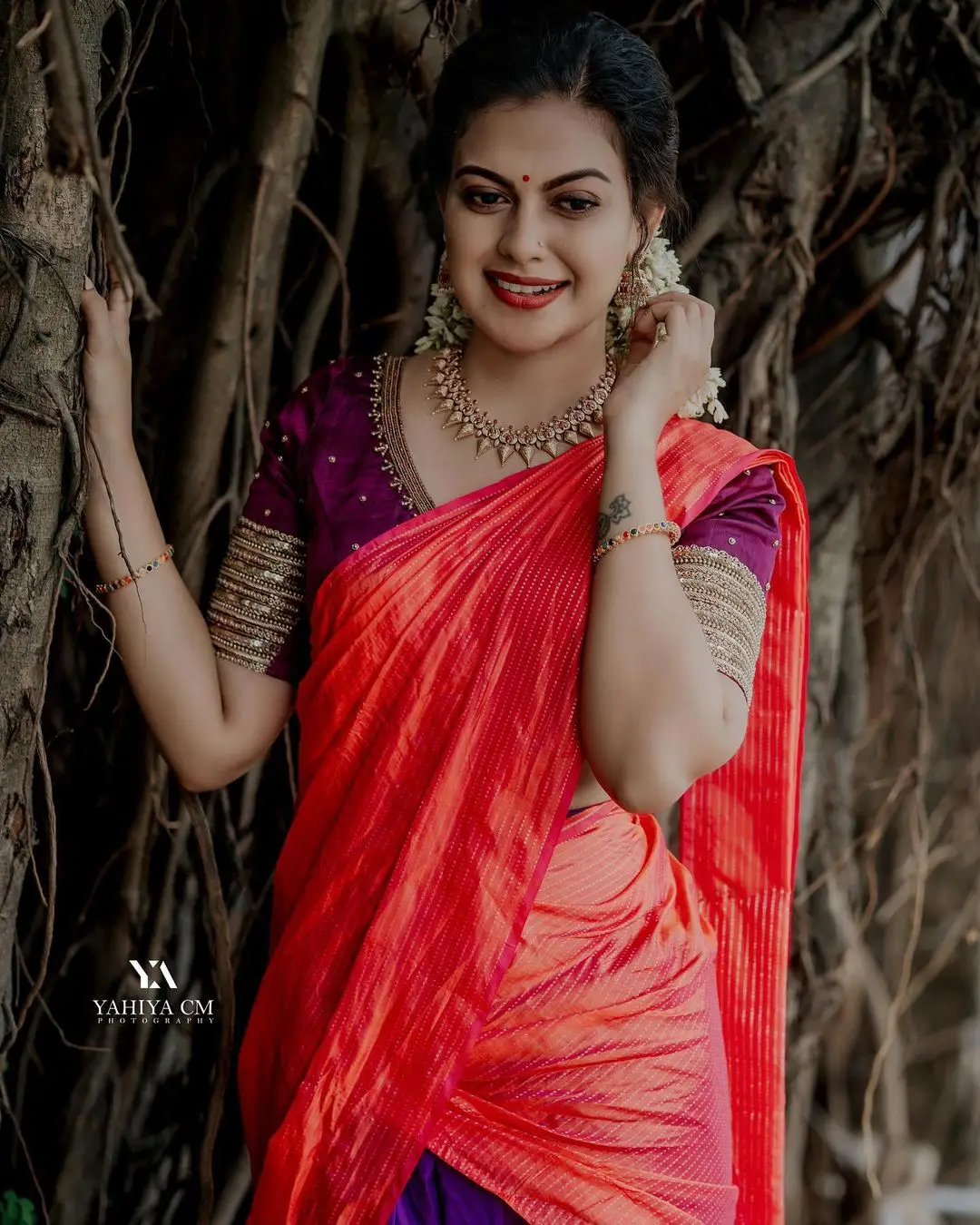 Anusree Nair in Beautiful Earrings Jewellery Red Saree Blue Blouse